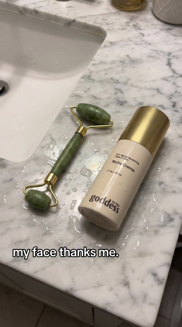 Riche Crème and jade roller on marble